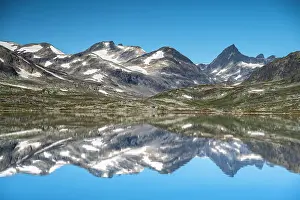 Jotunheimen: Mountains reflected in Lake Tyin, Jotunheimen National