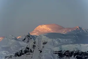 Neko: Mountains snow capped at dawn