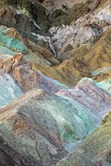 Artist: The multi-hued volcanic and sedimentary hills of