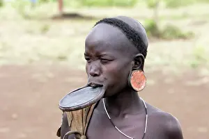 Disk: Mursi people - woman with lip plate / plug / disk