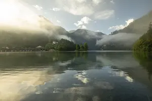 Home: Mystical morning at Konigssee in Schonau with boathouses and Christlieger