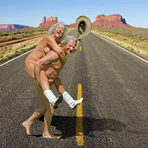 Weird: Naked couple wearing cowboy boots and hat crossing road in M