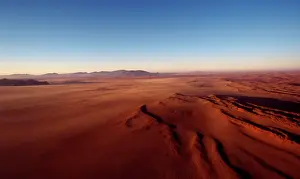 Textures: Namibia - Edge of the red sand dunes of the Namib desert