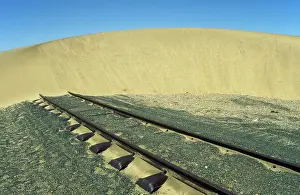 Lderitz: Namibia - rails and shifting dune (barchan dune)
