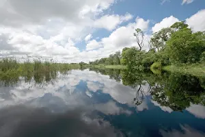 Strip: Namibia, Reflection of gathering rain clouds