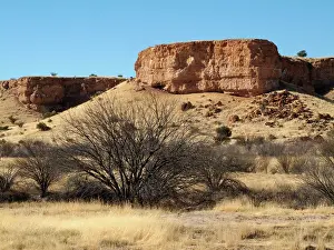 Auob: Namibia - Sandstone rock formations frame the dry
