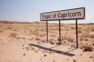 Marks: Namibia. Sign marks the Tropic of Capricorn