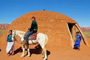 Indians: Navajo Indian - in traditional clothes in front of a Hogan