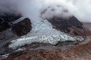 Descending: Nepal - Base of Langtang glacier in descending cloud