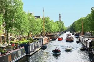 Amsterdam: Netherlands, Amsterdam, Boats cruise along