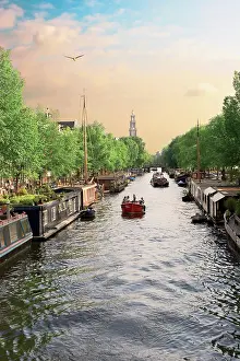 Amsterdam: Netherlands, Amsterdam, Boats cruise along