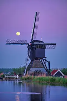 Moonlight: Netherlands rural landscape with windmills at famous