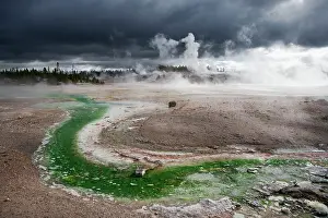 Metals: Norris Geyser Basin with approaching storm clouds