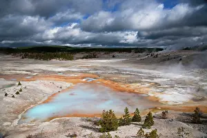 Metals: Norris Geyser Basin with approaching storm clouds