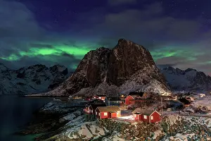 Estuary: Northern Lights or Aurora Borealis over red rorbuer