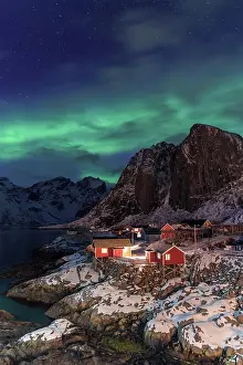 Estuary: Northern Lights or Aurora Borealis over red rorbuer
