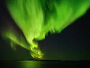 Greenland: Northern lights over the fjord Nuup Kangerlua. Nuuk