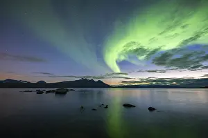 Swedish: Northern Lights over Lake Akkajaure and Akka mountain range