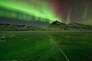 Peter Mather: Northern Lights Ogilivie Mountains in the background