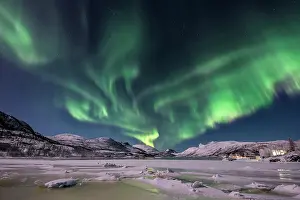 Situation: Northern lights over the Senja Island, Troms, Norway