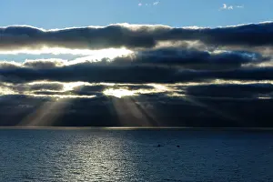 Rays: Norway. Two boats crossing Vestfjorden