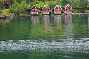 Norwegian: Norway. Red boathouses
