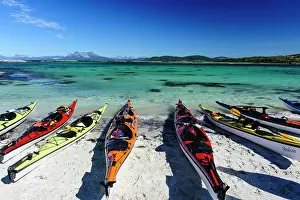 Kayaks: Norway. Sea kayaks on a coral-sand beach