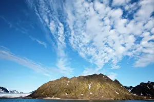 Fair: Norway, Svalbard, Clouds above steep cliffs
