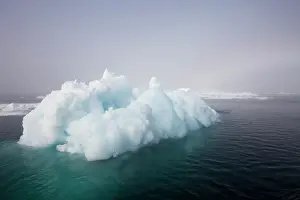 Silent: Norway, Svalbard, Iceberg floating in still