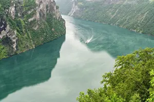 Ship: Norway. Tourist ship navigates fjord. ic Don Grall / Jaynes