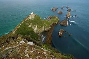 Nugget: Nugget Point - sea stacks called nuggets and Nugget