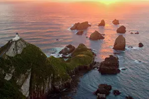 Nugget: Nugget Point - sea stacks called nuggets and Nugget