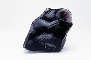 Glassy: Obsidian, an igneous rock
