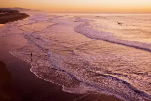 Surfers: Ocean Beach at sunset; well-known surfers beach