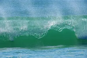 Breaks: Ocean Wave - turquoise coloured wave breaks at