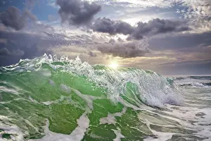 Waves: ocean waves against a sunset
