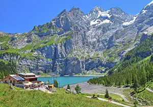 Bern: Oeschinensee with mountain inn and Bluemlisalp