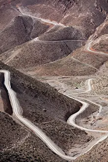 Cars: Off-road vehicle on gravel road to Mount Mgoun