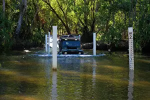 Landrover: Offroad driving - Landrover Defender crossing a river