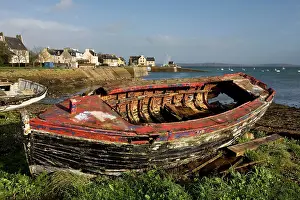 Wrecks: Old Boat on shore by harbour