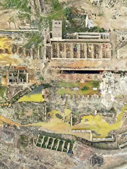 Mining: Old mining site and deep orange-red hues in the water of a pool in the mineral-rich area of the Rio Tinto mines