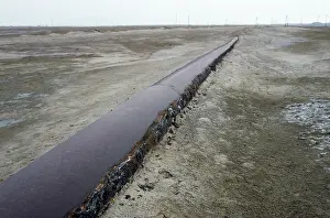 Chemicals: An old rusty pipe-line - carrying extracted iodine