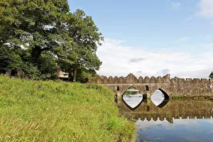 Connected: Old stone bridge beneath the Tintern Abbey, County