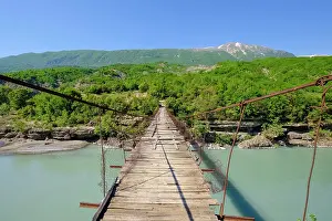Suspension: Old suspension bridge over Vjosa river, upper Vjosa