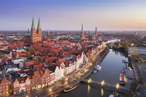 Ages: Old town and river Trave in the evening - Luebeck