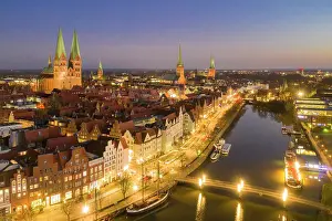 Ages: Old town and river Trave in the evening - Luebeck