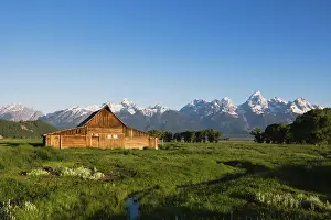 Cabins: Old wooden barn and Grand Teton Range, Antelope