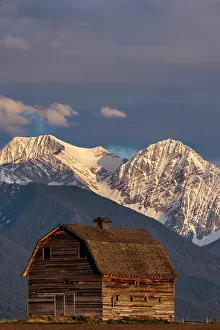 Wooden: Old wooden barn and Mission Mountains near Pablo, Montana