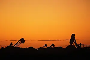 Blower: Opal mining silhouette of mining operation with blower