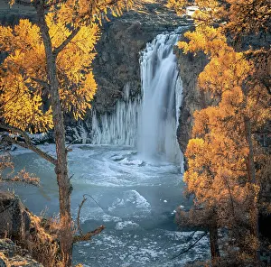 Surrounded: Orchon waterfall surrounded by autumnal coloured